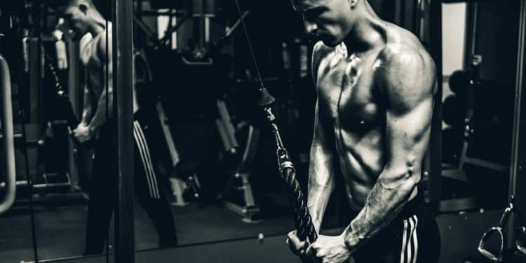 grayscale photo of man exercising